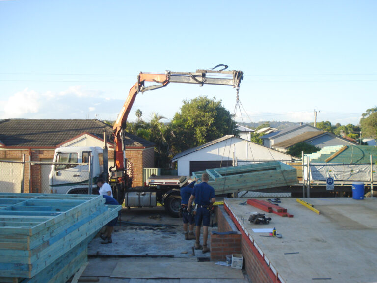 Buildingwise 207a Lambton Road New Lambton New Framework Getting Loaded by crane from flatbed truck to construction site