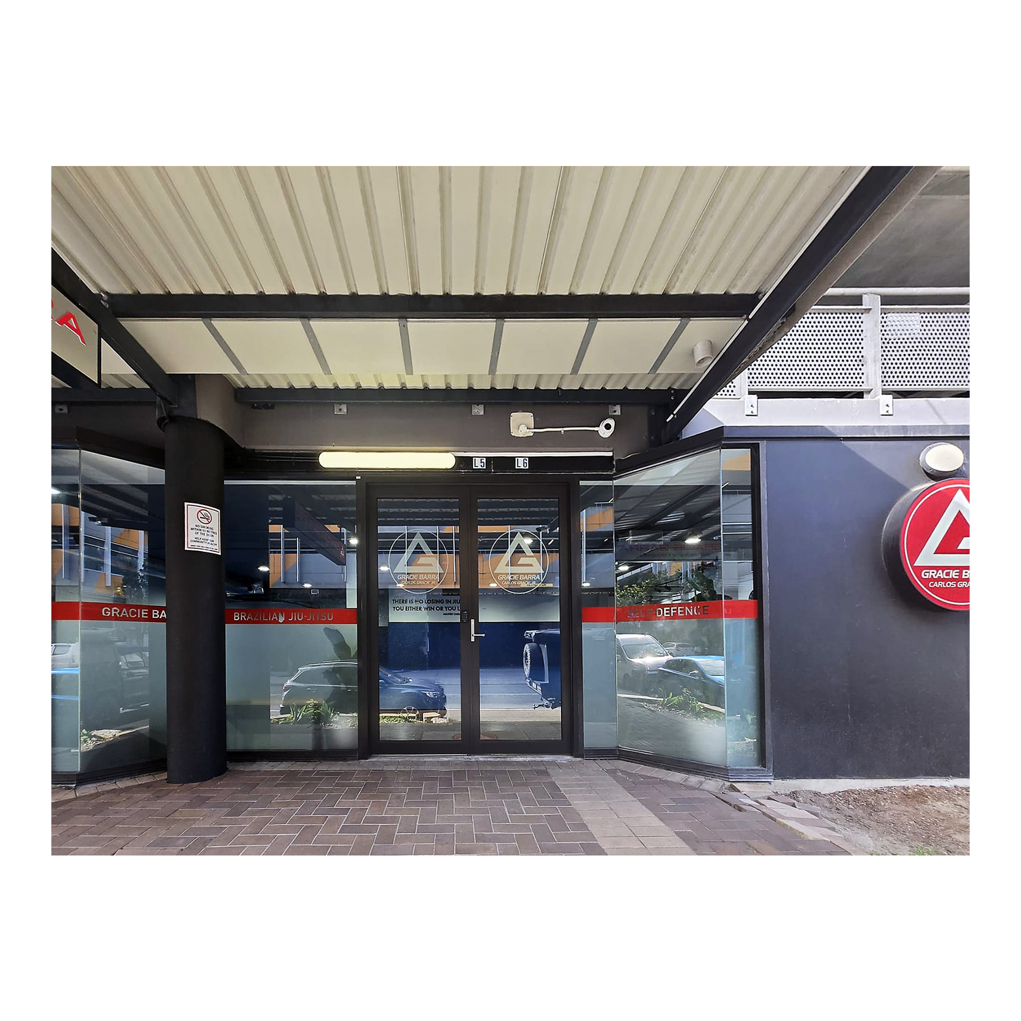 front doors of Gracie Barra Charlestown after CDC private certification
