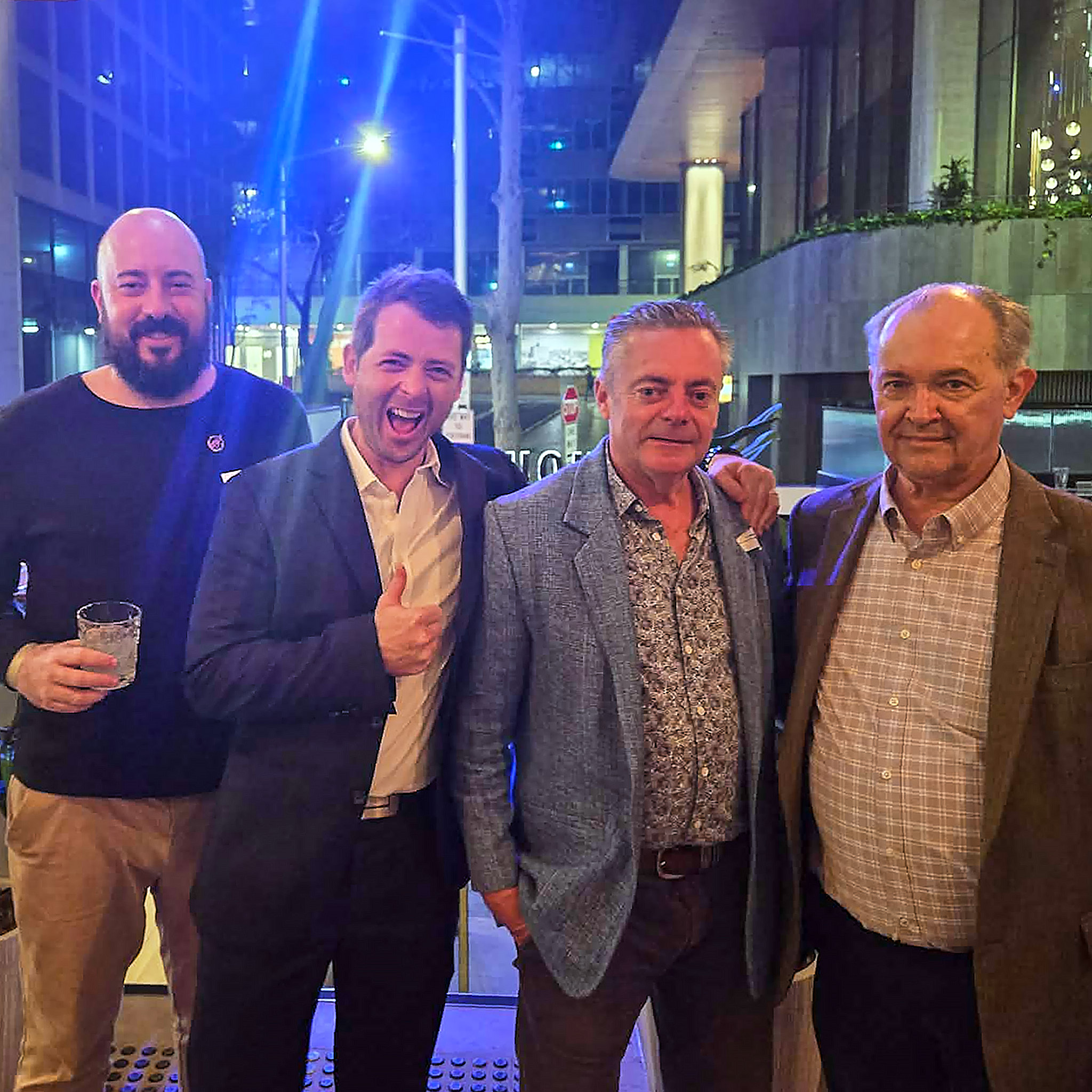 Four men in a group photo, 2 Building Certifiers with 2 BCS representatives at a private certifier industry event at the Firehouse Hotel in Sydney NSW