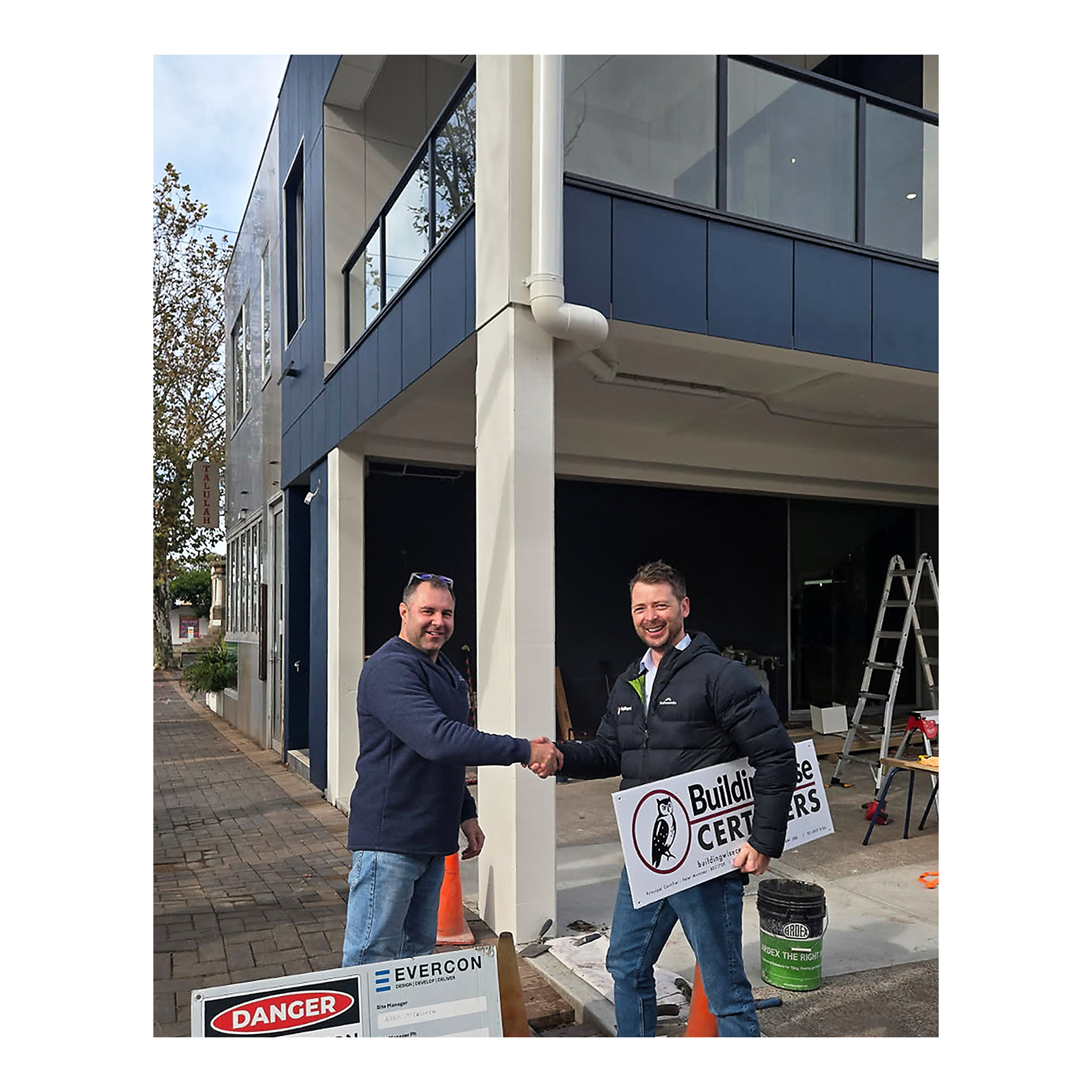 Our commercial private certifier shakes hands after another successful completed job with the commercial builder Angus from Evercon